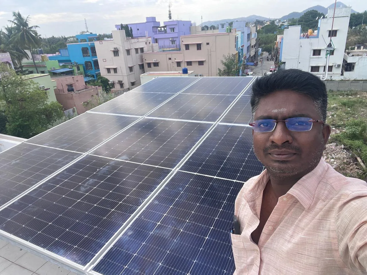 JP Solar System project team with rooftop solar panels